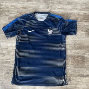 Nike Dri-Fit men’s large soccer jersey.
